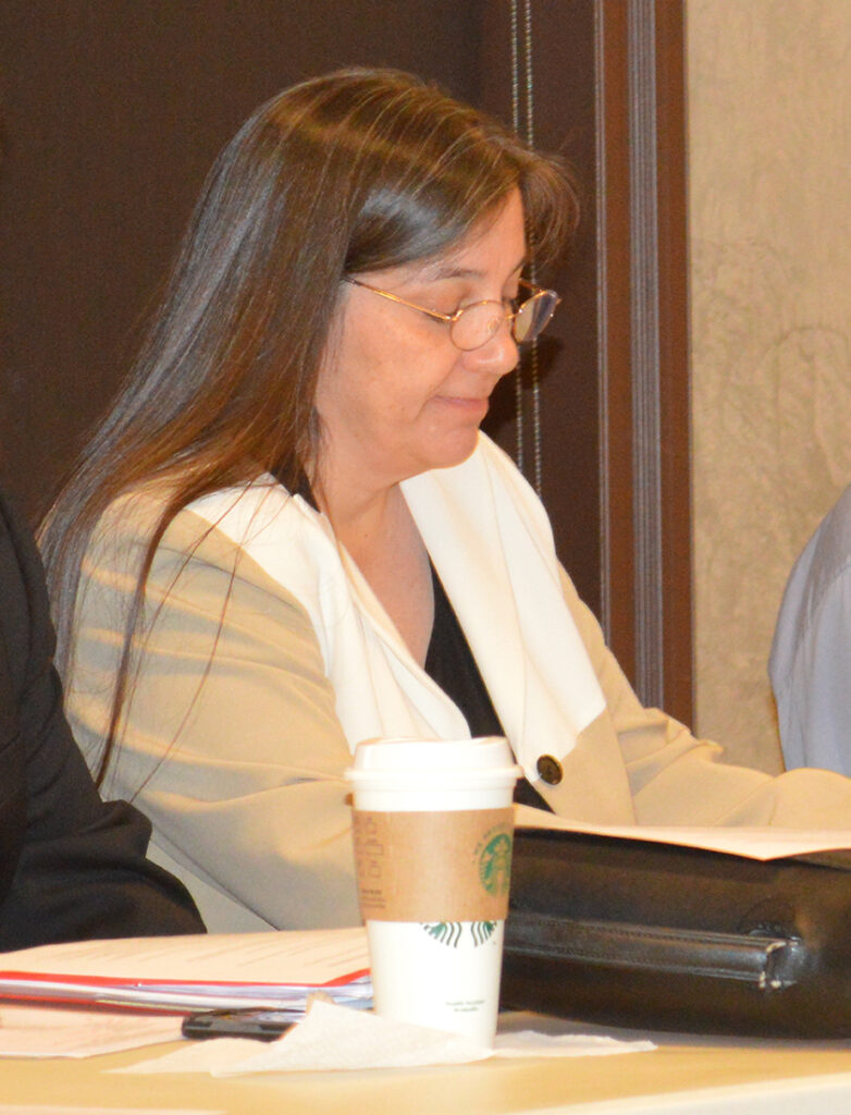 Sandonne Goad at desk